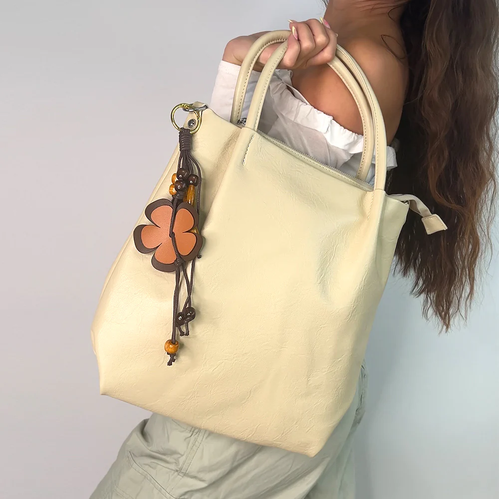 Alessa Shoulder Tote Bag With Floral Charm in Black - Image 7