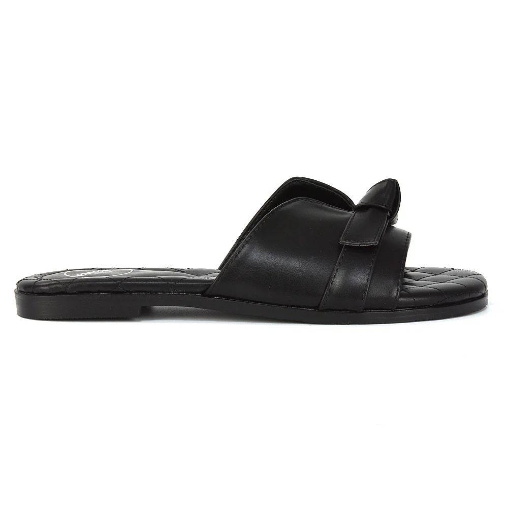 Ariella Cut Out Quilted Insole Bow Flat Slider Sandals in Black Synthetic Leather - Image 8