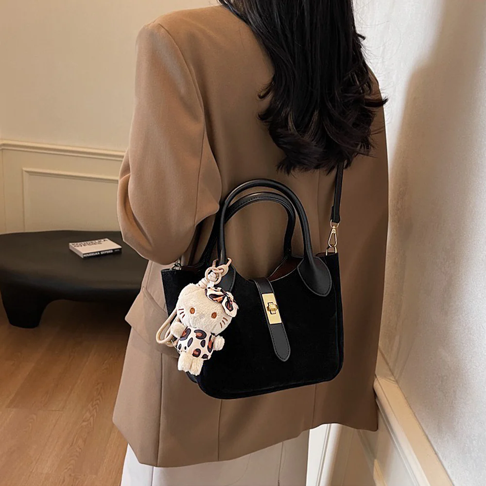 Nicole Crossbody Shoulder Tote Bag With Gold Buckle and Bag Charm in Tan Faux Suede - Image 11