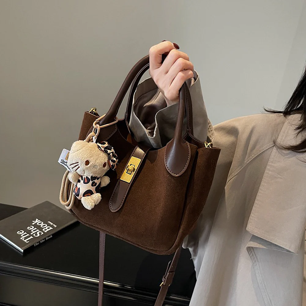 Nicole Crossbody Shoulder Tote Bag With Gold Buckle and Bag Charm in Tan Faux Suede - Image 7