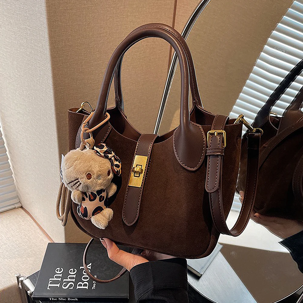 Nicole Crossbody Shoulder Tote Bag With Gold Buckle and Bag Charm in Tan Faux Suede - Image 9