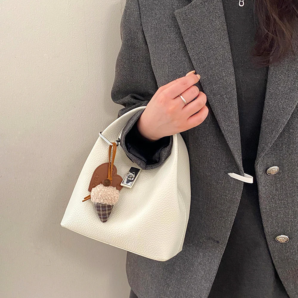 Storm Small Crossbody Bag With Detachable Bag Charm in Tan - Image 15