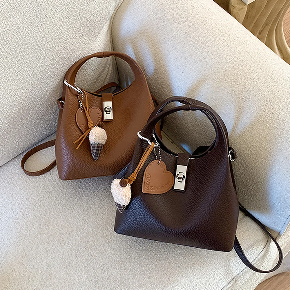 Storm Small Crossbody Bag With Detachable Bag Charm in Tan - Image 2